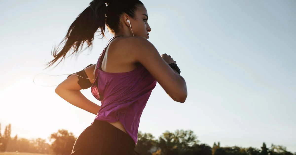 Woman running outdoors in the evening